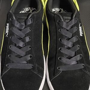 Black and green with bow womens puma shoes size 9.5